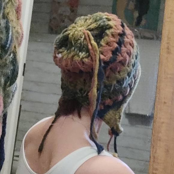hand-crocheted multicolor beanie with ear flaps and tassel details. - Picture 3 of 6